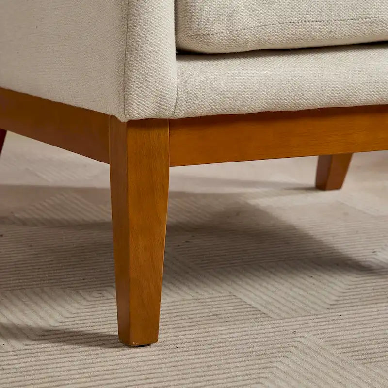 Fauteuil à dossier haut rembourré de 26.18 avec pieds en bois