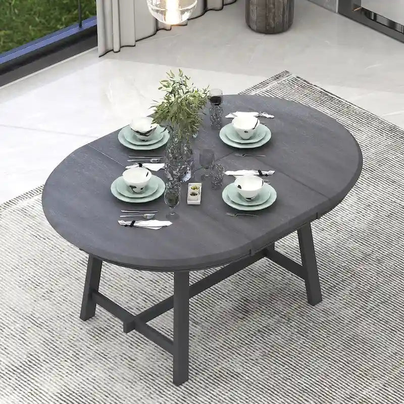 Ronde uitschuifbare retrohouten eettafel voor de eetkamer